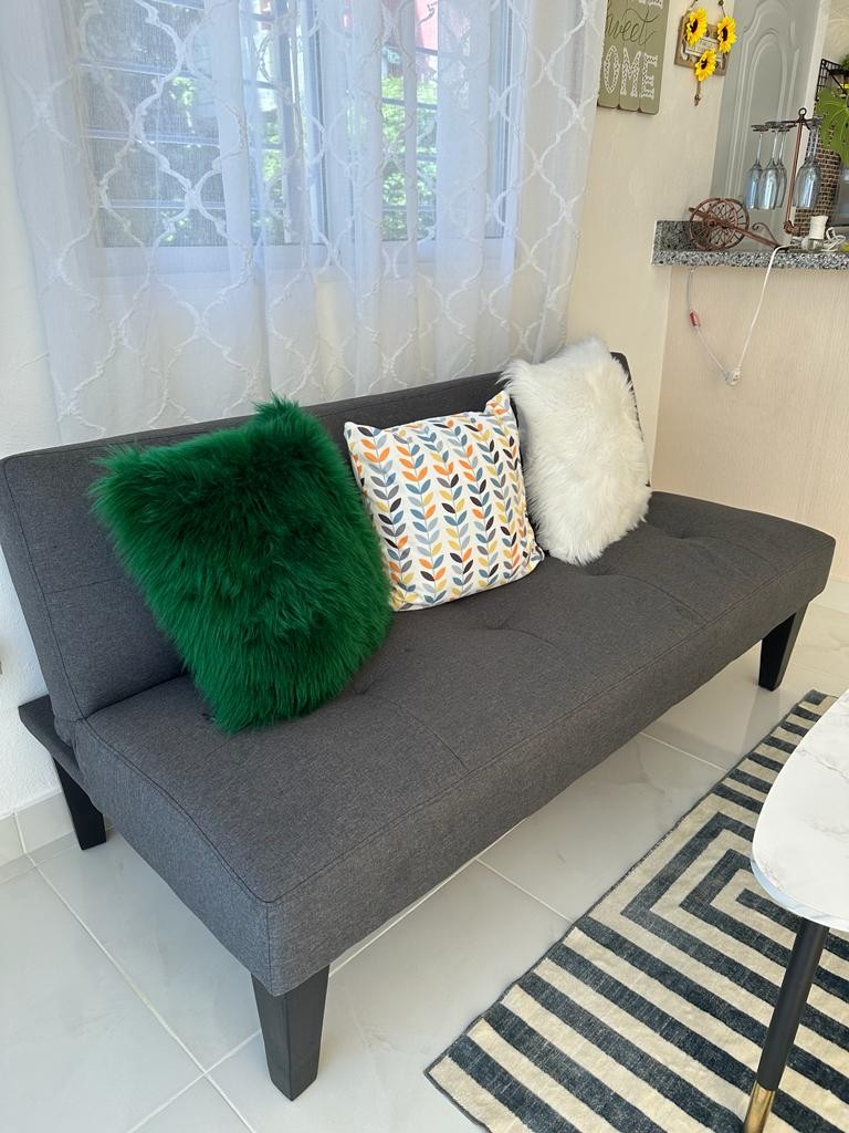 muebles y colchones - Mueble color gris, es un sofá-cama de oportunidad.  1