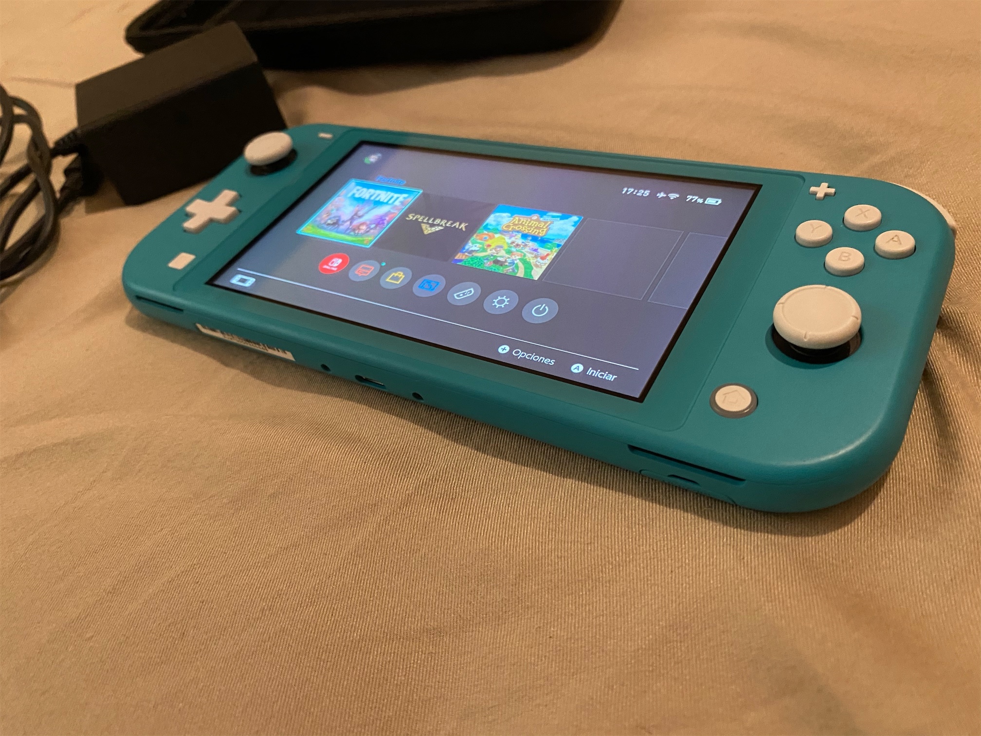 consolas y videojuegos - Nintendo Switch Lite Turquesa cargador y bulto