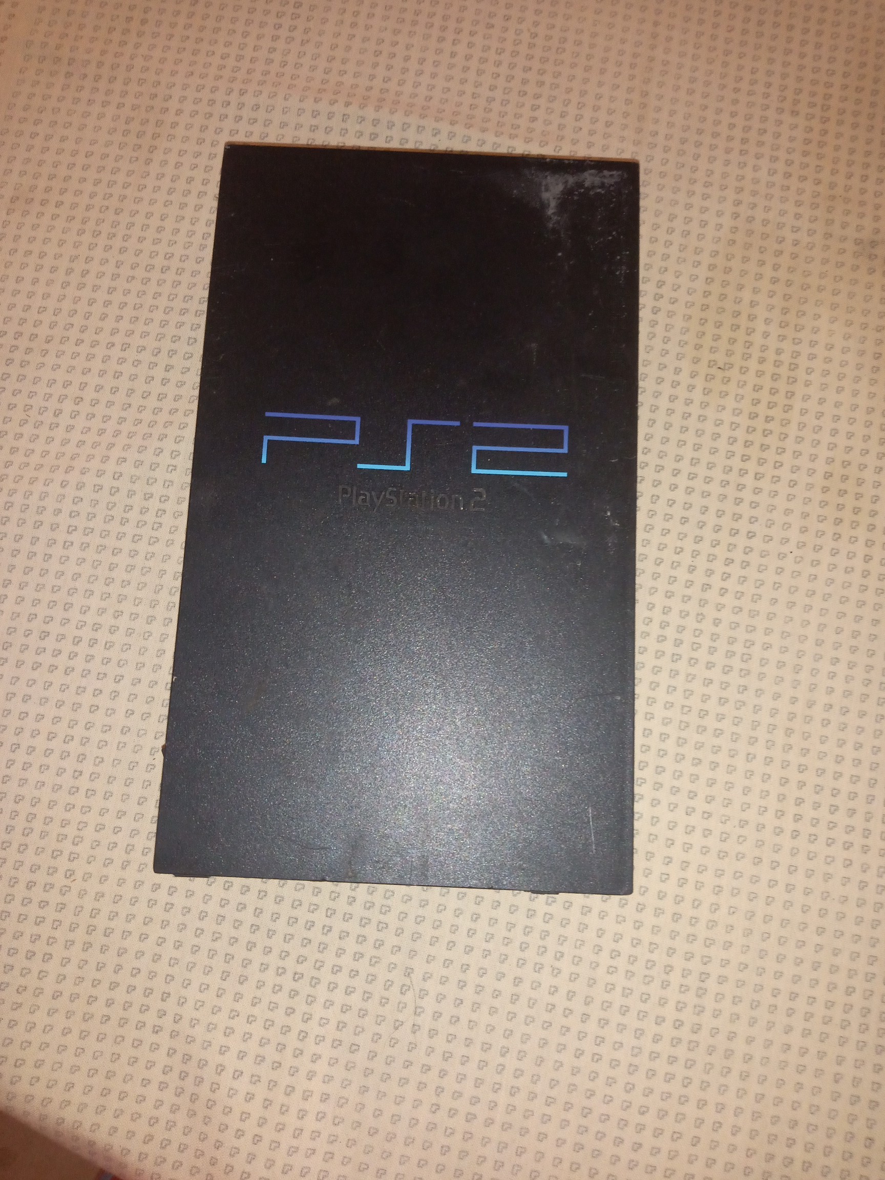 consolas y videojuegos - Vendo este PS 2 está bueno trae con el un juego y no trae control