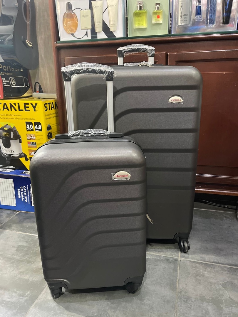 carteras y maletas - Set de 2 maletas grande para 50 libras y pequeña $4550