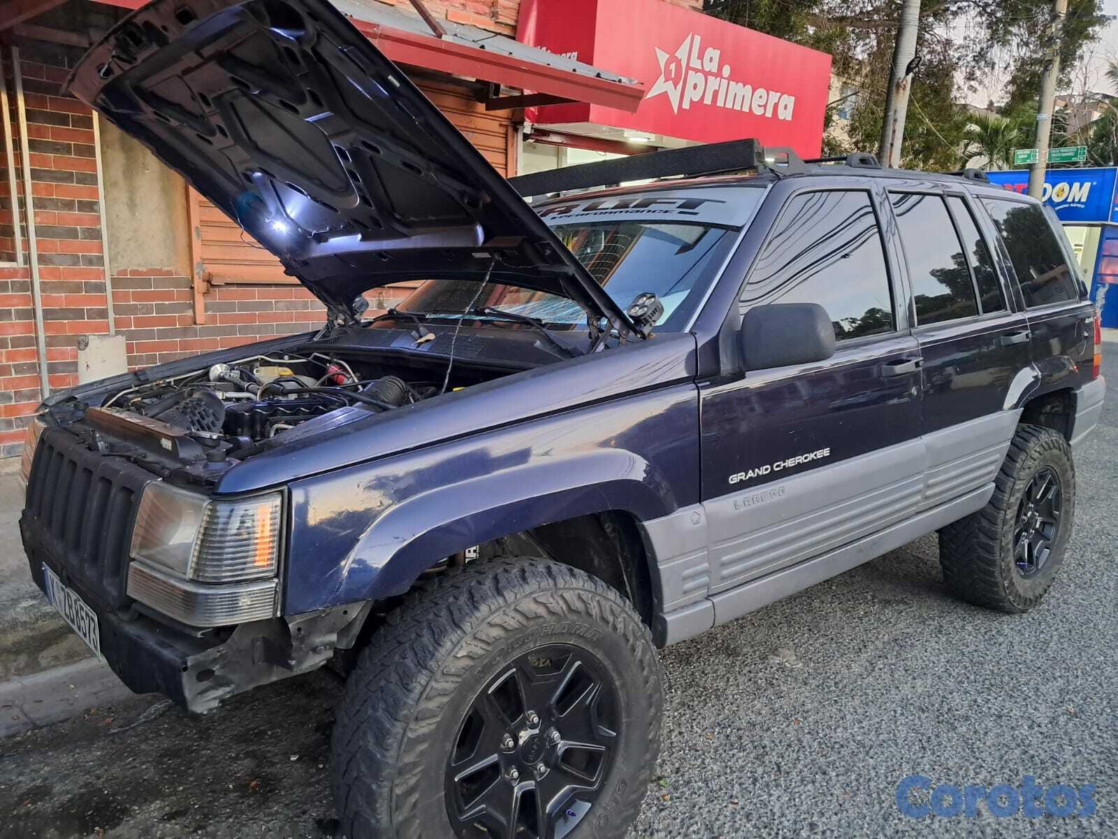 jeepetas y camionetas - jeep. grand cherokee laredo,1998 tremenda maquina para montear 4x4 6