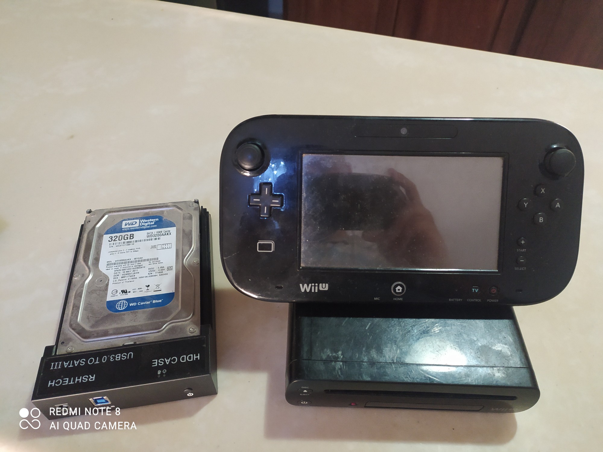 consolas y videojuegos - Wii U con Disco duro externo de 320 GB con juegos