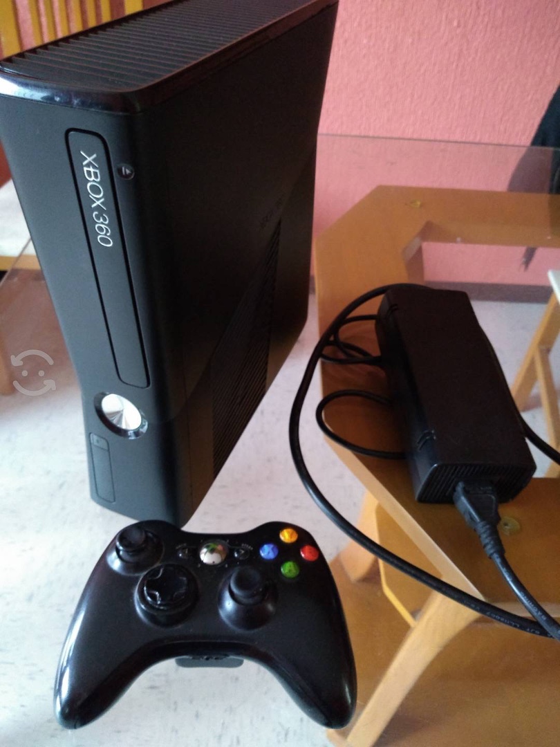 consolas y videojuegos - Vendo o cambio Xbox 360 slim con 5 juegos cambió por ps3 slim 