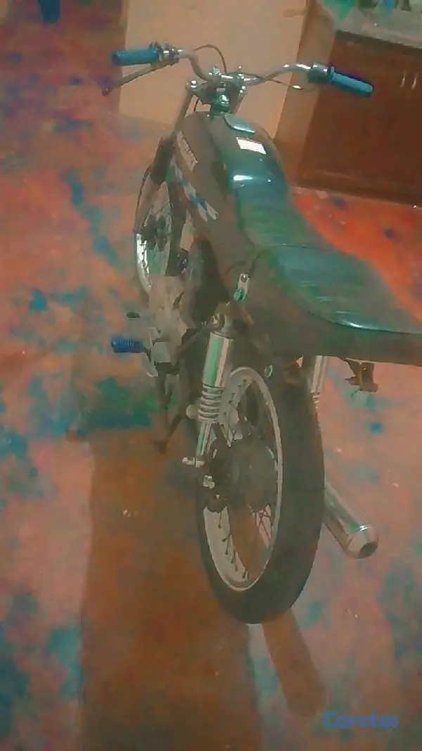 motores y pasolas - vendo ax 100 Suzuki  2