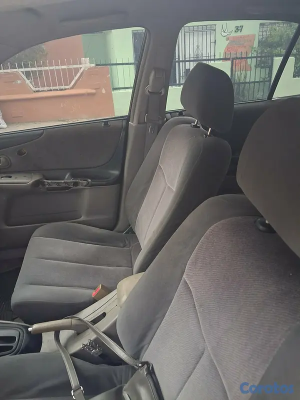 carros - Se vende Mazda 323 año 2002 4