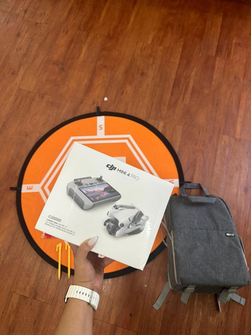 camaras y audio - DJI MINI 4 PRO FLY MORE COMBO BATTERY PLUS + PLATAFORMA DE ATERRIZAJE + MOCHILA 1