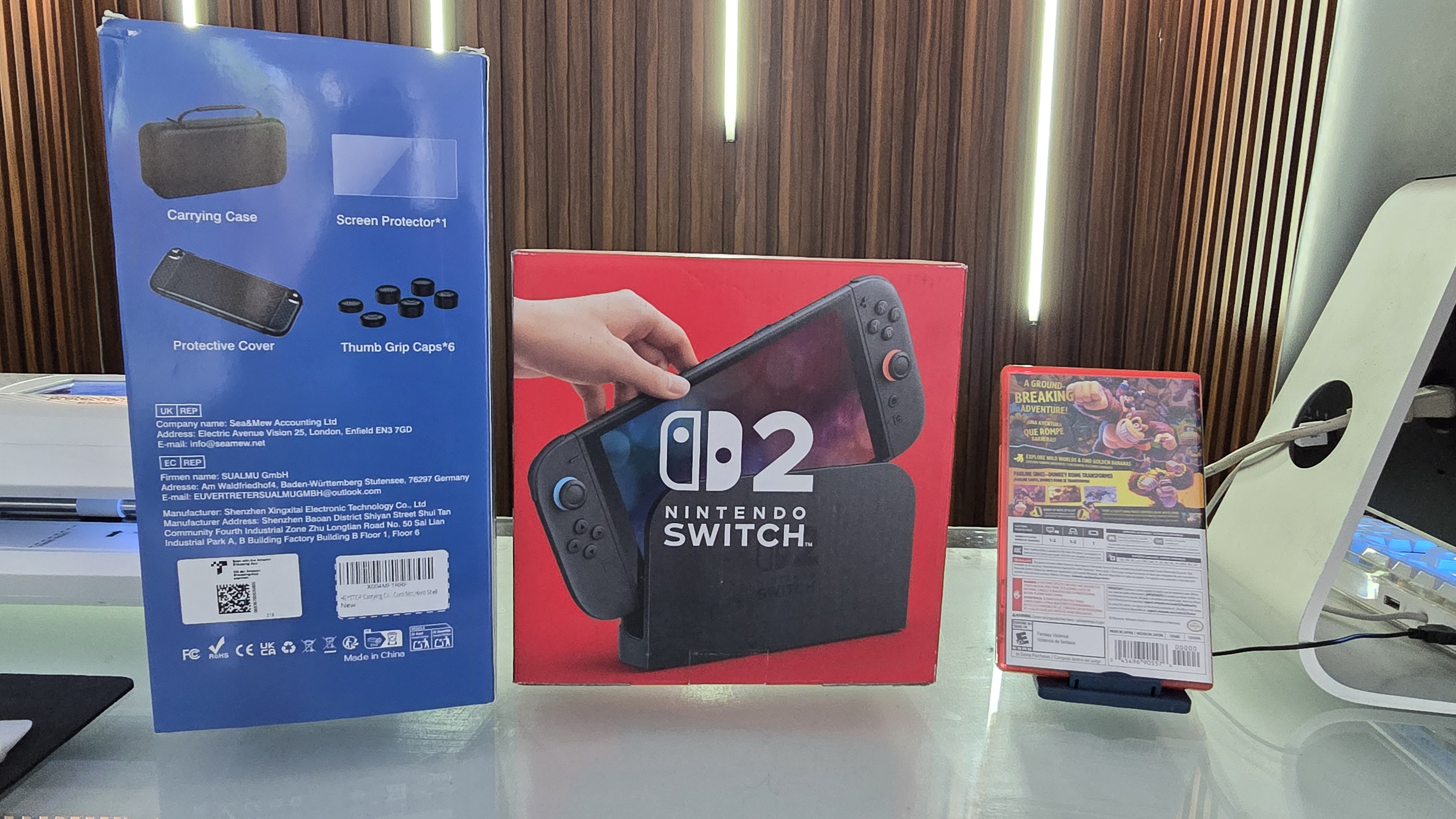 consolas y videojuegos - Nintendo Switch 2 en su caja mas donkeykong y mas 2