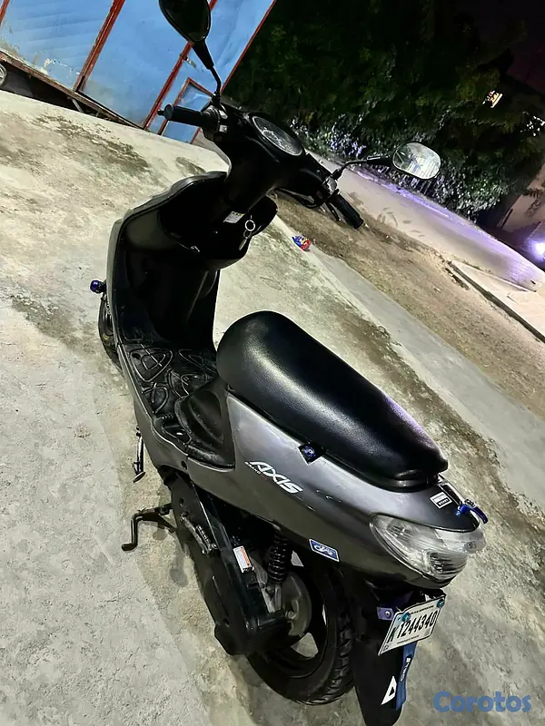 motores y pasolas - Honda Grand Axis 100 3