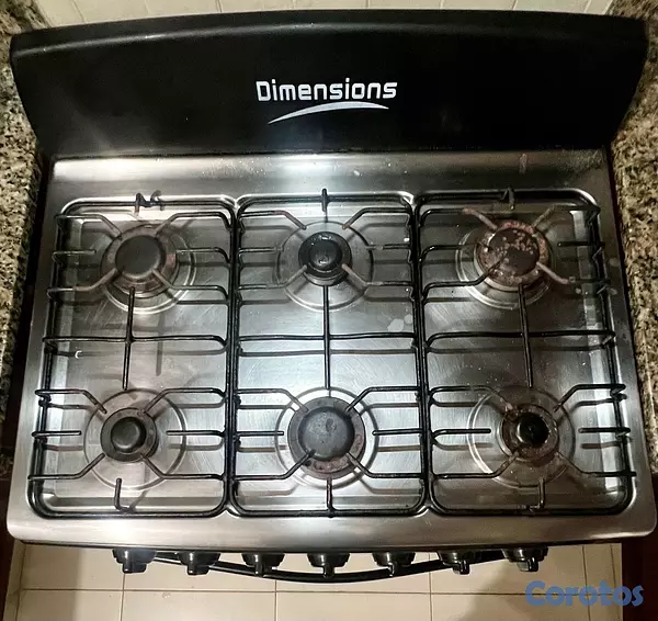 cocina - Estufa de gas Dimensions de 6 hornillas con horno funcionando  3