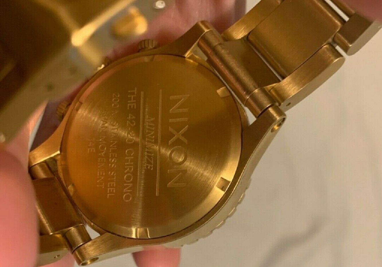 joyas, relojes y accesorios - Reloj NIXON 100% Original con baño en oro como nuevo 3