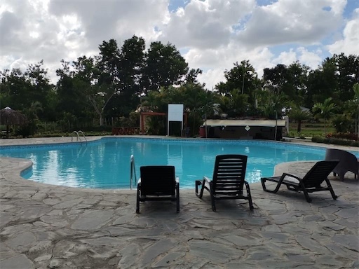 solares y terrenos - Venta de terrenos en proyecto vacacional con piscina y  lago Santo Domingo 5