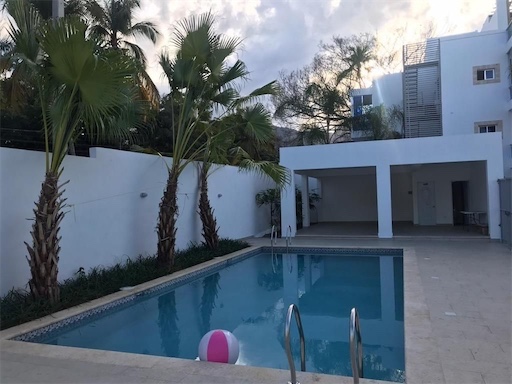 apartamentos - Moderno apartamento a solo 3 minutos de la playa caminando con piscina 1