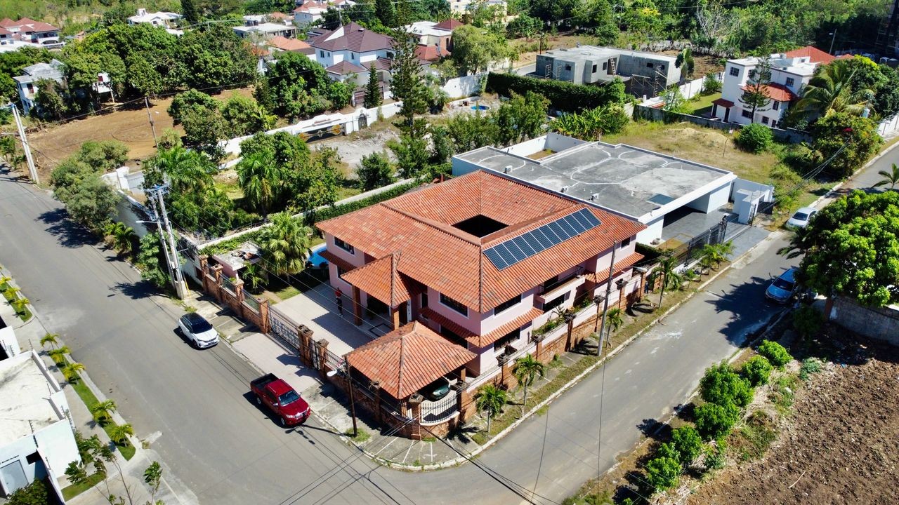 solares y terrenos - TERRENO CON MEJORA DE 835MTS2 URBANIZACION THOMEN SANTIAGO  3