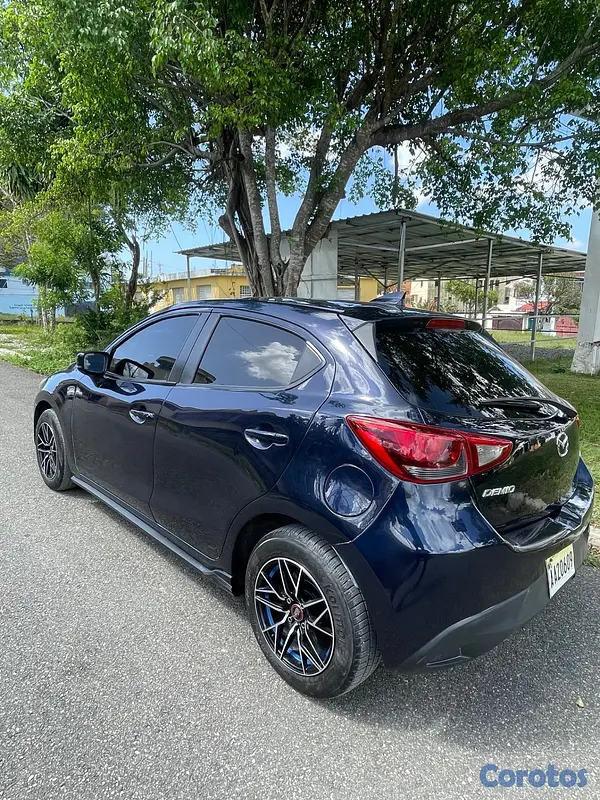 carros - Mazda Demio Turing 7