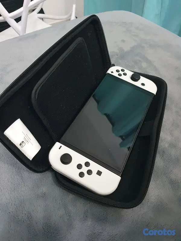 consolas y videojuegos - Nintendo Switch Oled y Protector 6