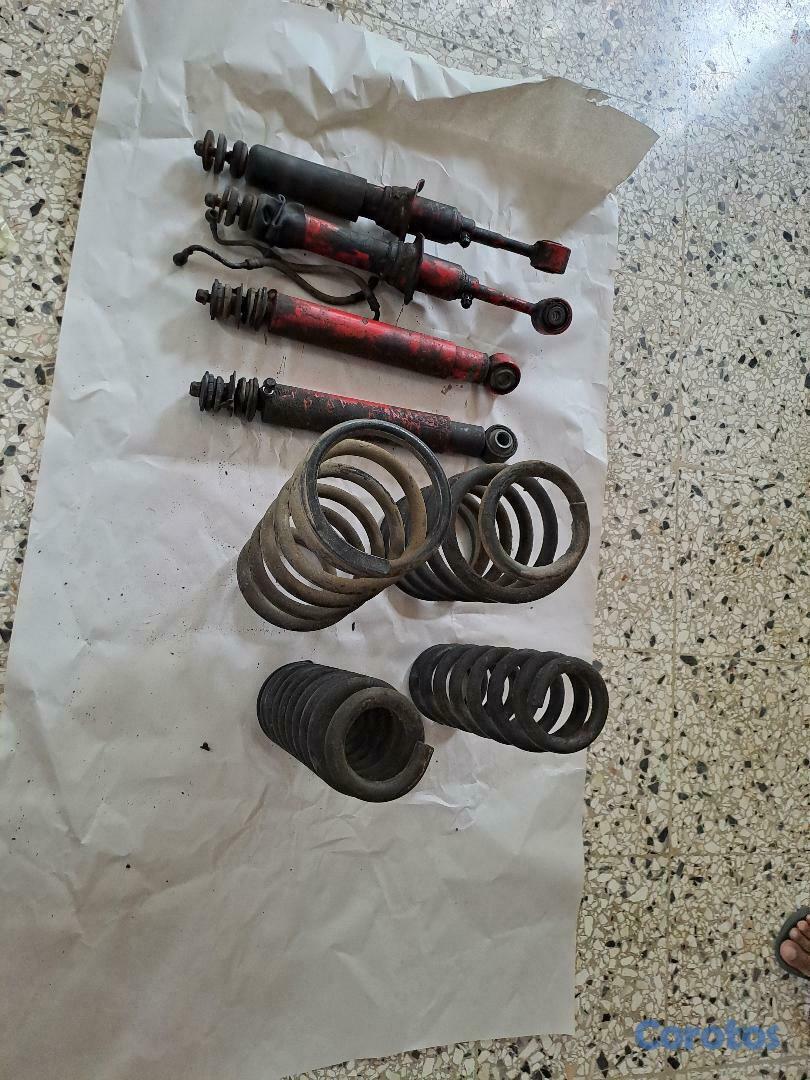 accesorios para vehiculos - AMORTIGUADORES