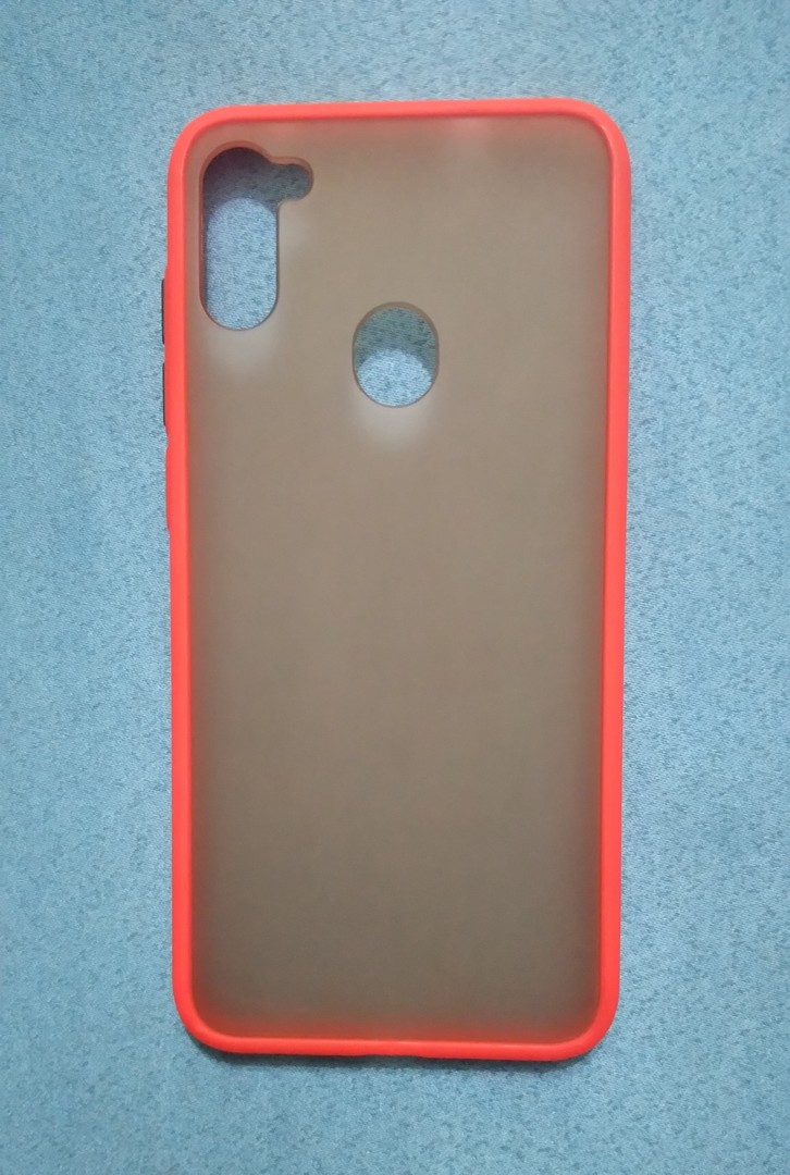 celulares y tabletas - Forro para celular
Samsung Galaxy A11 
Color: Marrón claro con borde rojo