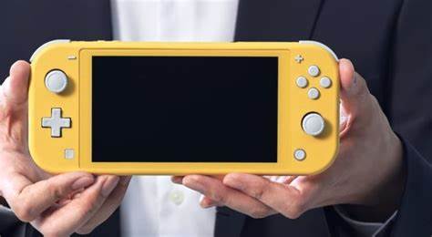 consolas y videojuegos - intendo switch , color amarillo con cartullo 