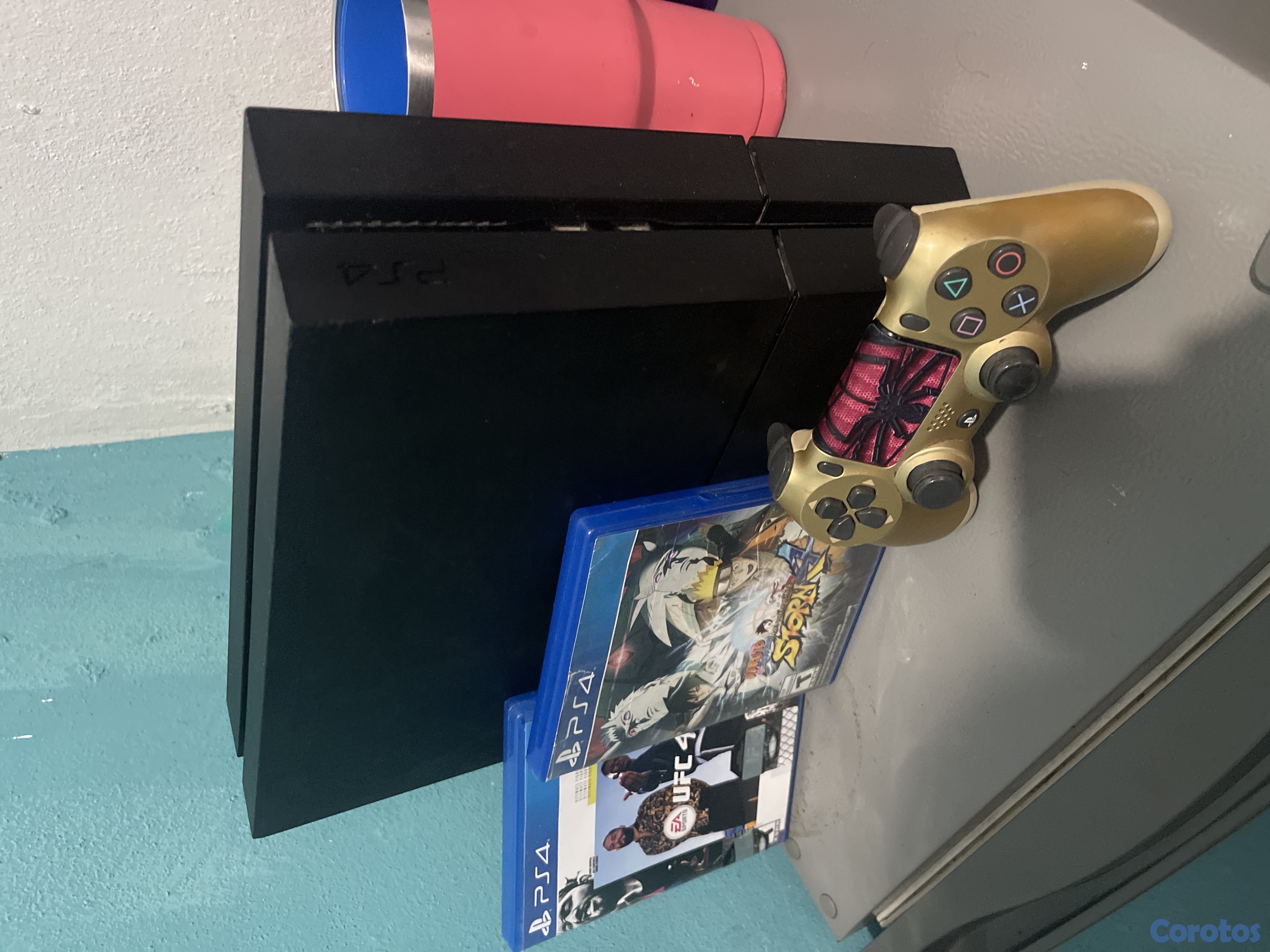 consolas y videojuegos - vendo ps4 Fat incluye 1 control y 3 juego  2