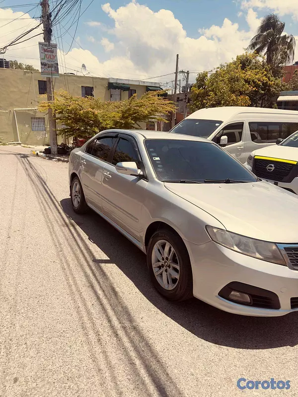 carros - kia lotse 2010 3