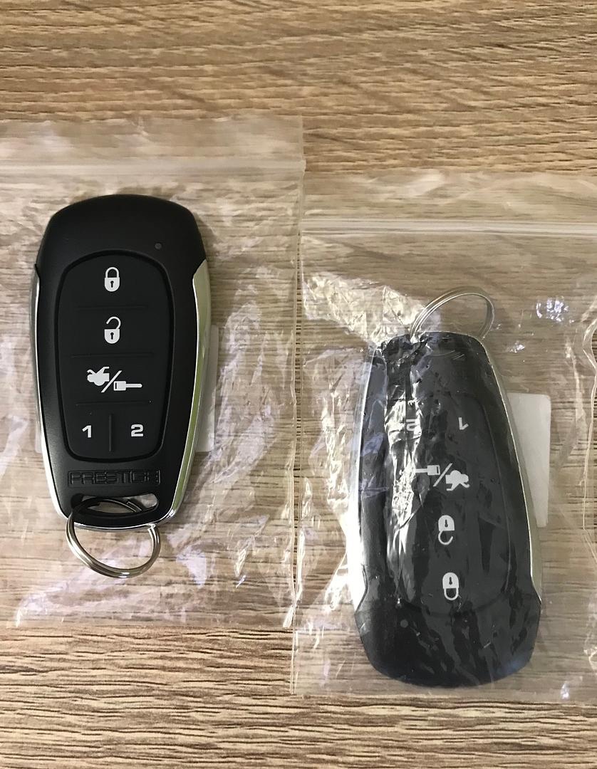 accesorios para vehiculos - Transmisor remoto alarma Prestige 145SP (Luz verde). 