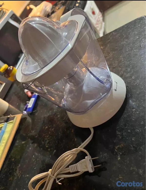 cocina - Exprimidor de naranja marca Oster 5