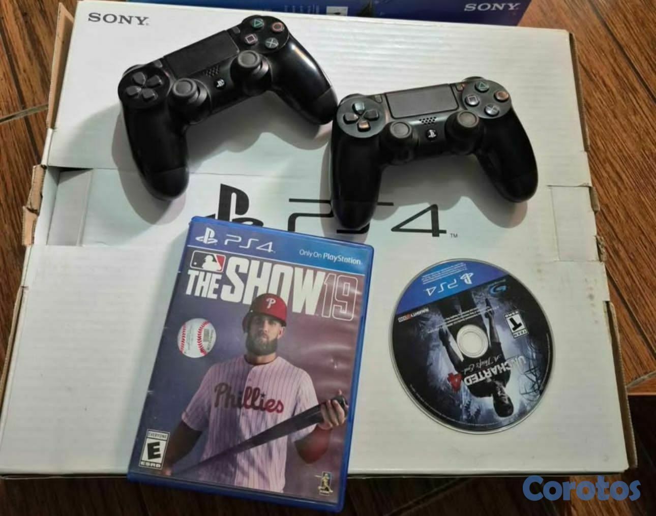 consolas y videojuegos - PS4 SLIM 500GB con dos controles y 2 juegos más cargador de controles y HDMI 1