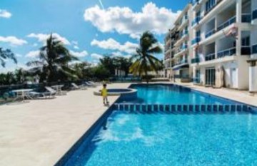 apartamentos - Alquilo en Playa Boca Chica, 2 cuartos, 1 baño, piso 2, piscina, amueblado,WiFi.
