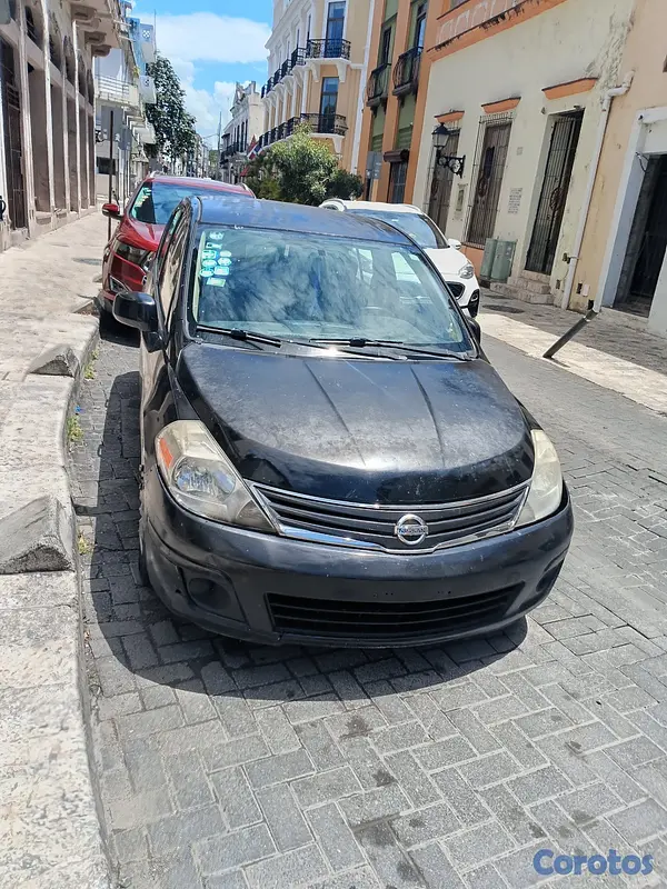 carros - VENDO NISSAN VERSA 4