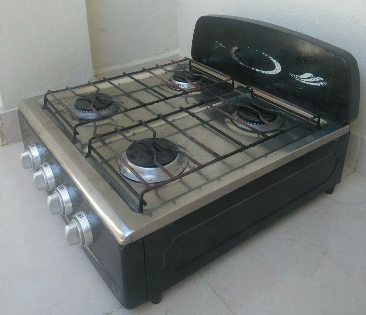 cocina - Vendo Estufa de mesa  marca American  modelo N 175 de 4 hornillas usada.
