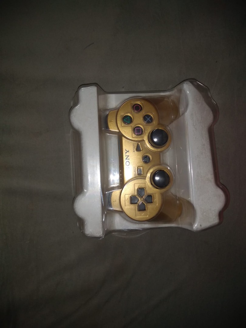 consolas y videojuegos - Control de PlayStation 3 dorado inalámbrico